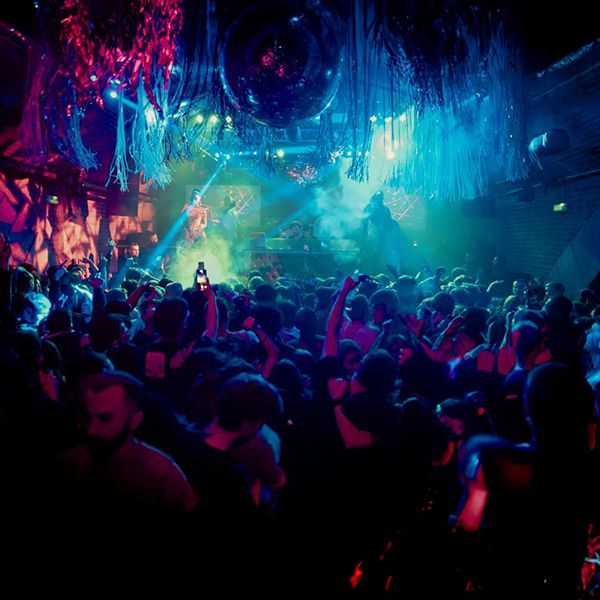 Michael Avenue DJing at a club event in Berlin.